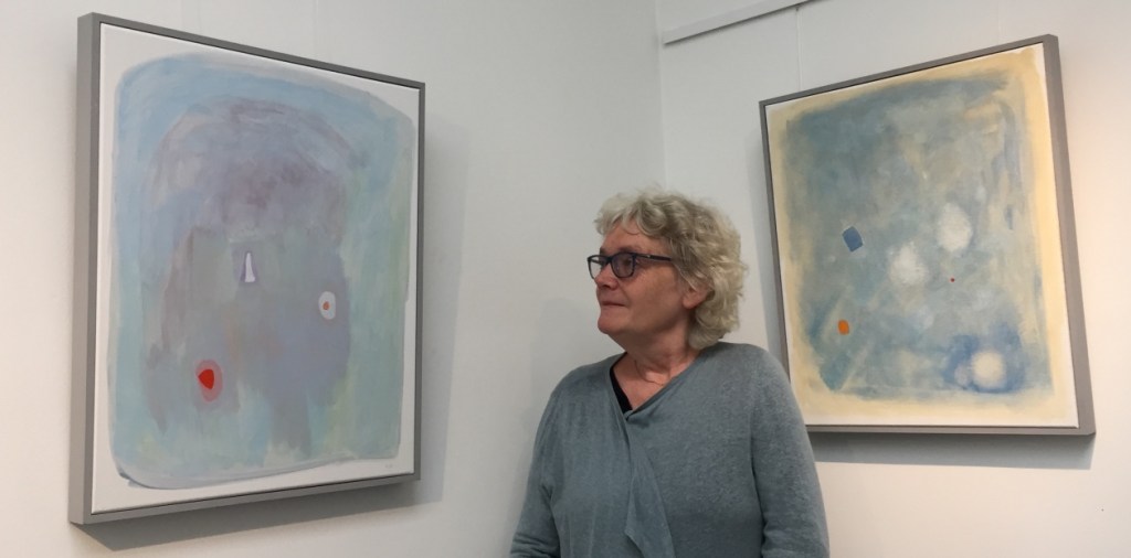 Catherine with two of her paintings